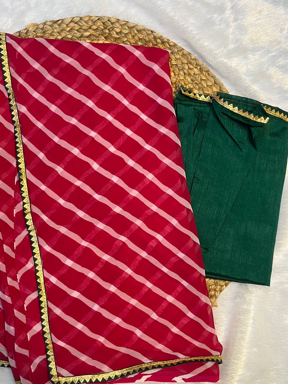 Pink and White Striped Georgette Saree with golden detailing on the border